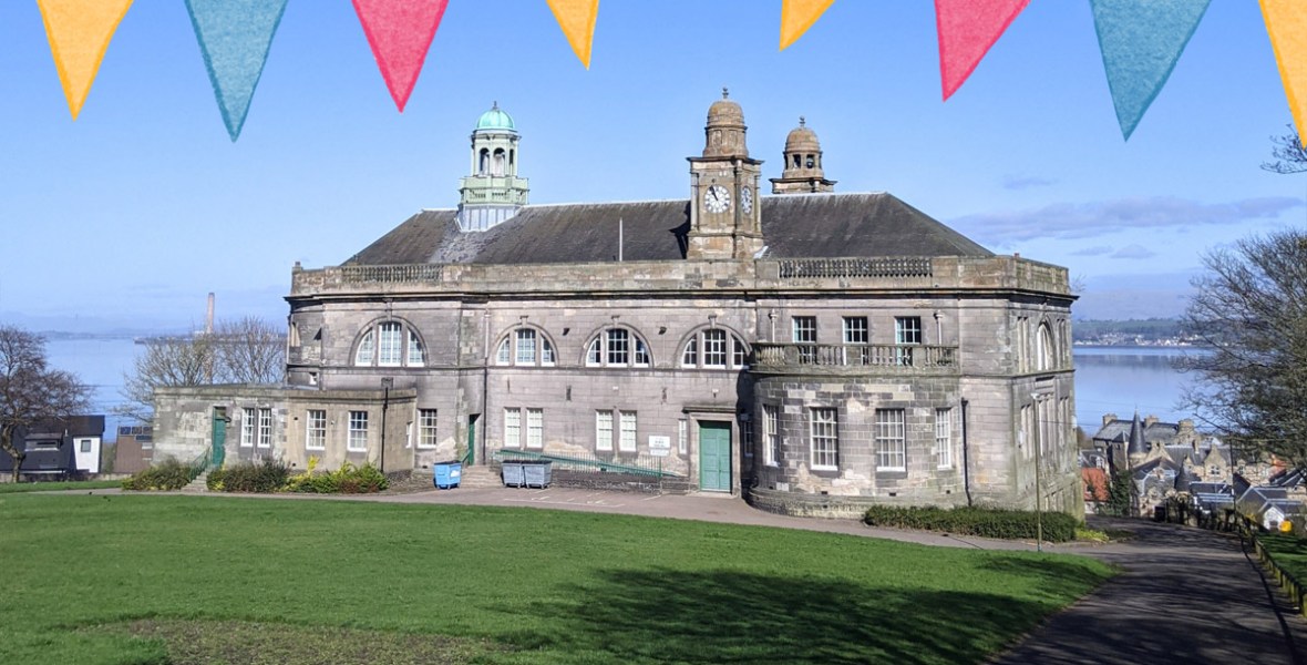 Bo'ness Town Hall on a sunny day with flags graphic.